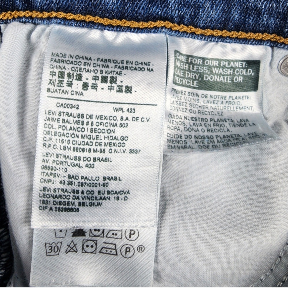 Levis Womens High Rise Medium Wash Distressed Denim Shorts Raw Hem Medium Blue - Picture 5 of 6